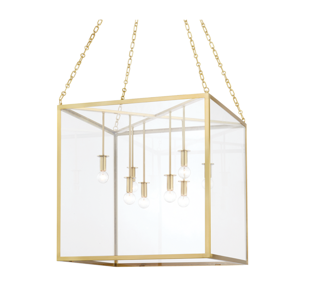 Hudson Valley pendant light with gold frame and clear glass on a white background