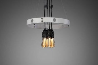 Chandelier with multiple light bulbs on a gray background, featuring the brand 'Buster & Punch'.