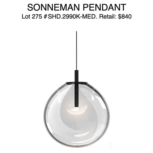 Sonneman pendant light with clear glass shade and black fixture on a white background