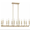 Gold island pendant light with multiple candles on a white background